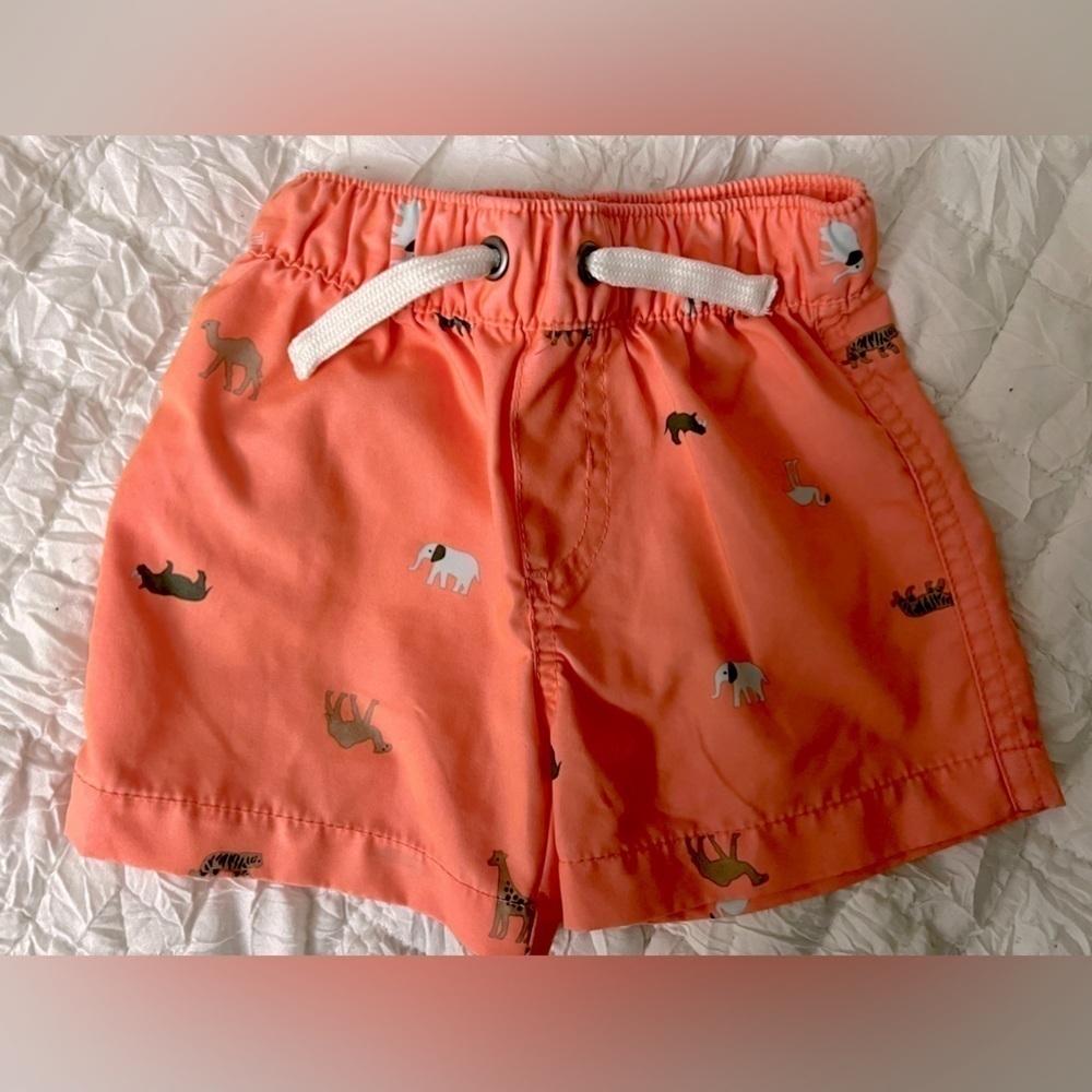 9m kid swim trunks. Orange with little wild animals. Functional drawstring